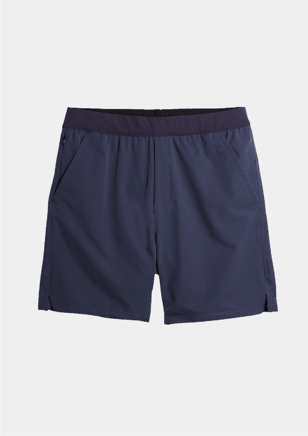 Mens Public Rec Flex Short in navy blue color. An athletic short that flexes for any activity: sweat, swim, or sun.