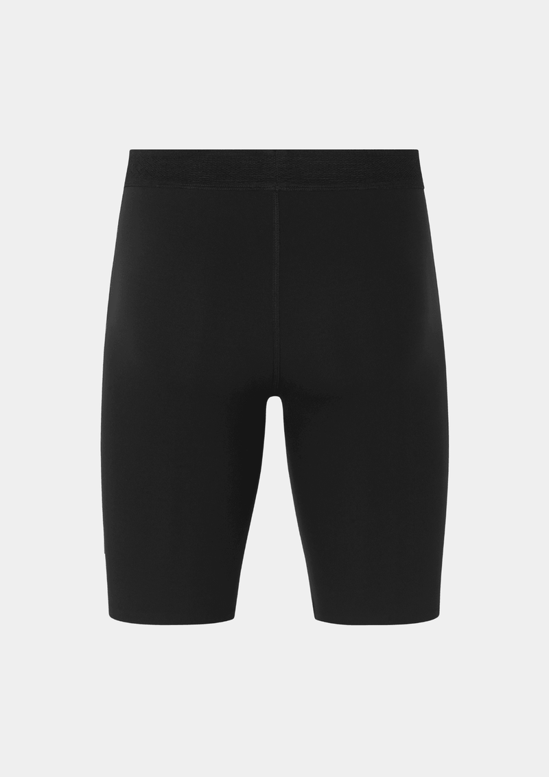 Back side view of the the Pas Normal Studios Men’s Balance Short Tights in the color black. Perforated elastic waistband and tight fit. No logo markings on the back of the shorts.
