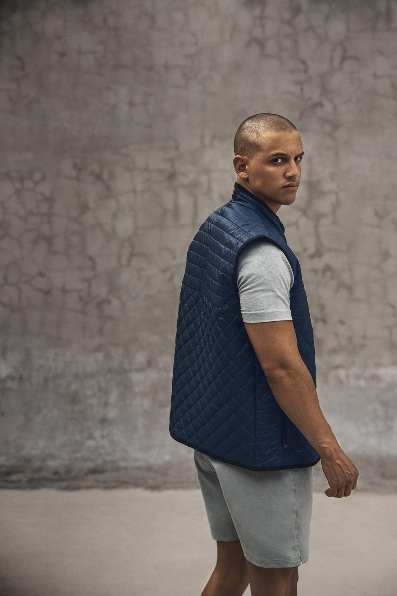Mens Public Rec Go-To Henley Short Sleeve | Heather Silver Spoon - styled under a vest