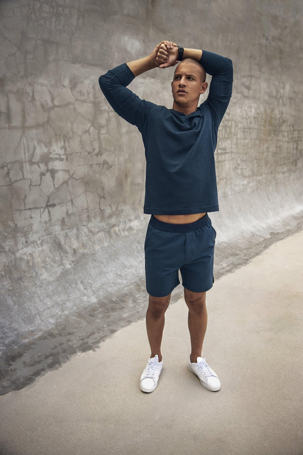 Mens Public Rec Flex Short in navy blue, styled with the Mens Public Rec Go-To Henley Long Sleeve